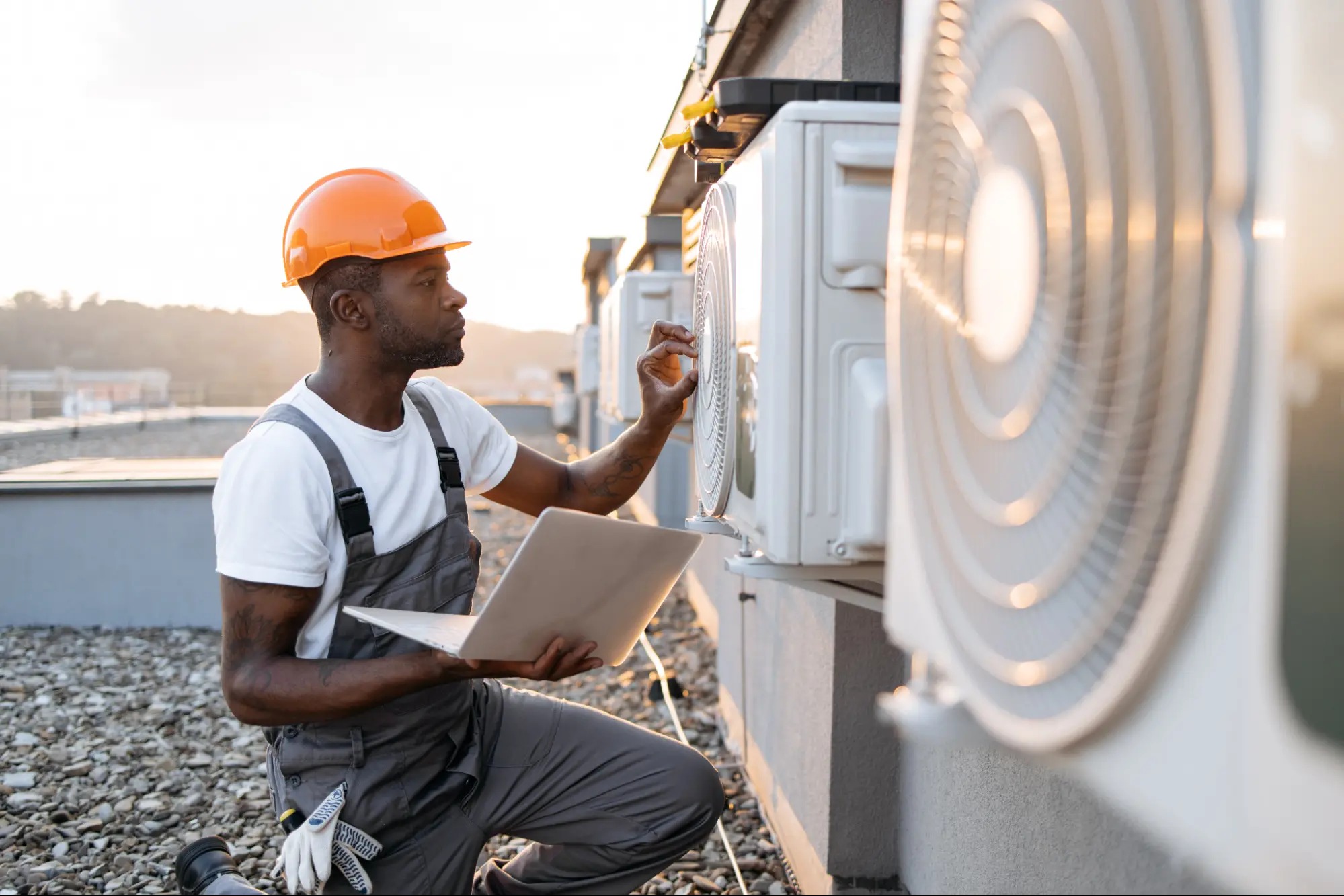HVAC technician servicing a furnace in Evergreen CO after installation