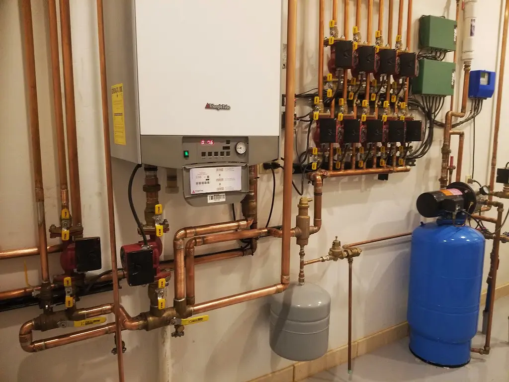 Boiler installation project Evergreen CO with energy-efficient residential heating equipment